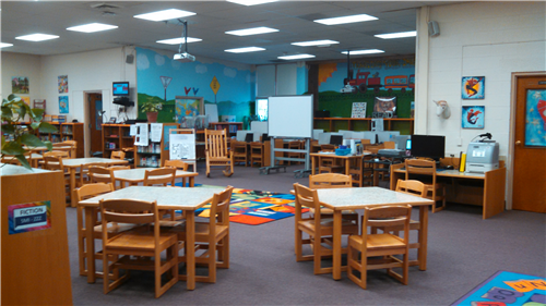 Larrymore Media Center learning area with tables and chairs 